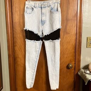 Light Wash Distressed High-Waist Jeans with Black Mesh